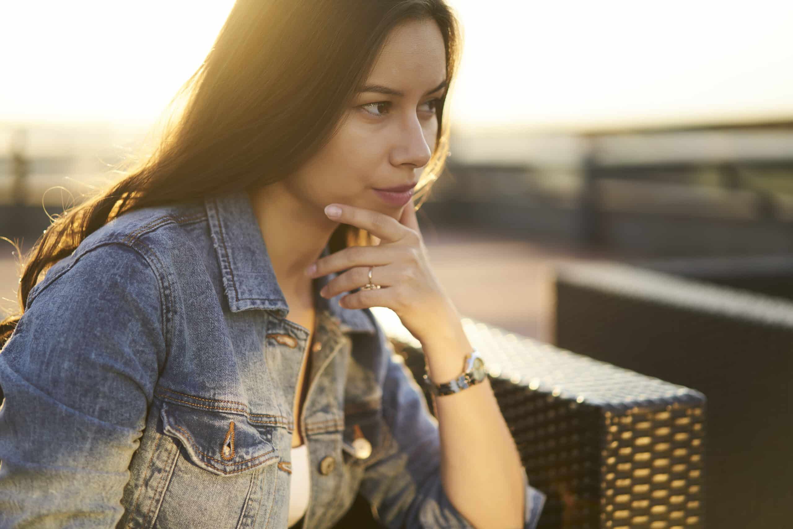 blonde woman outside in the sunlight